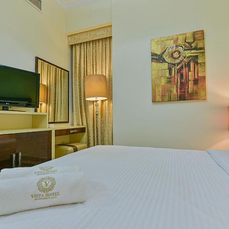 Vista Hotel Apartments Deluxe Dubai Exterior photo