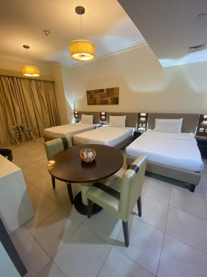 Vista Hotel Apartments Deluxe Dubai Exterior photo