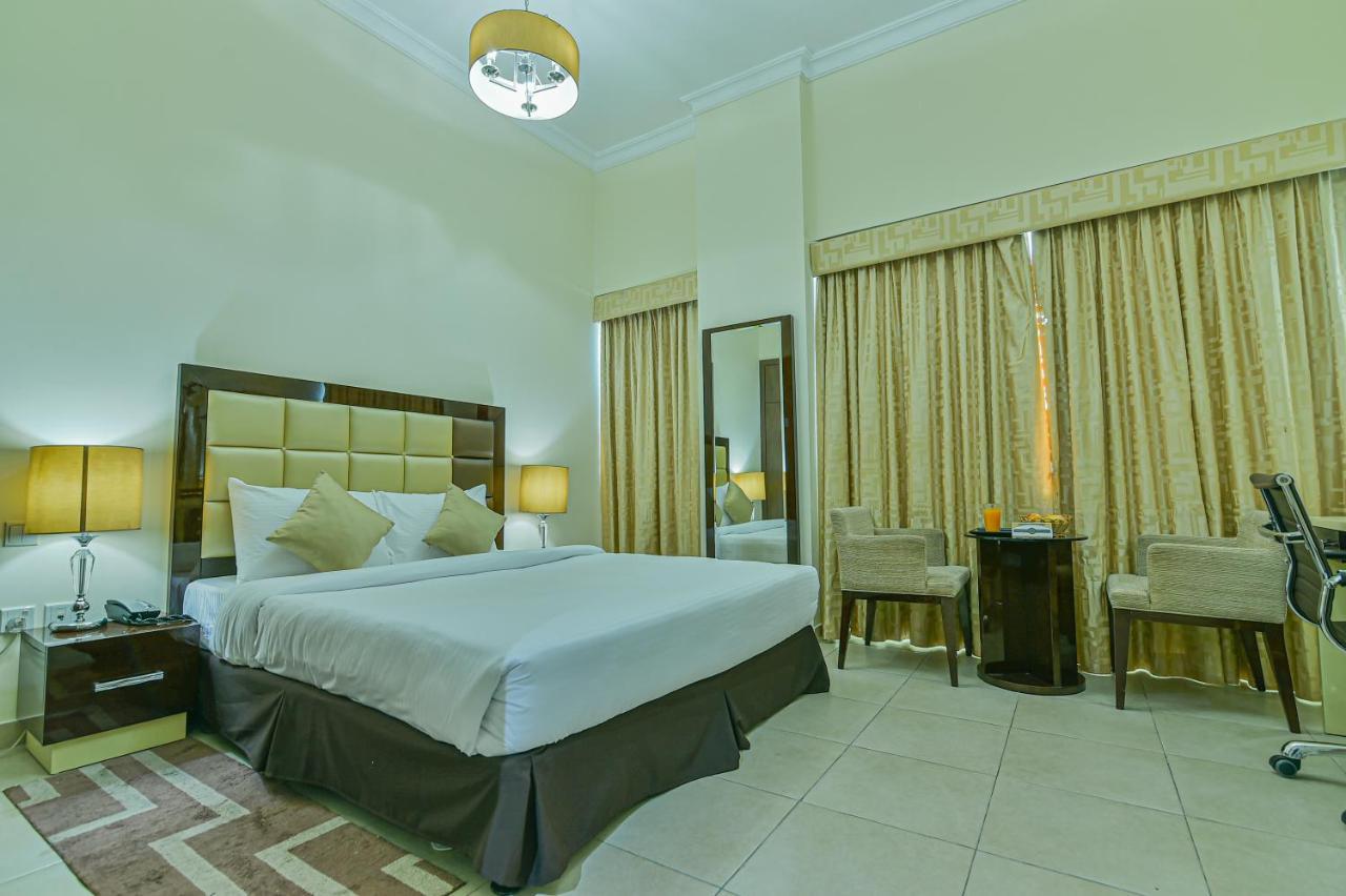 Vista Hotel Apartments Deluxe Dubai Exterior photo