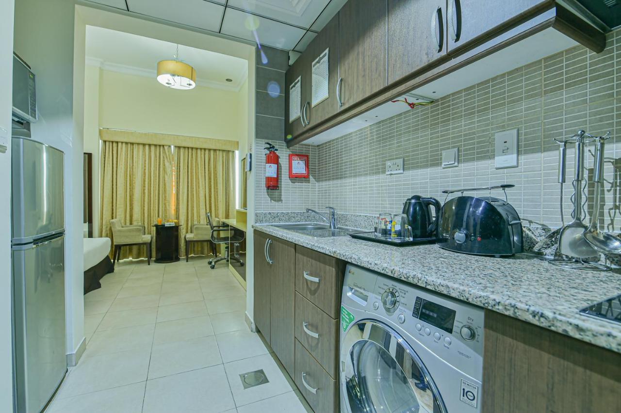 Vista Hotel Apartments Deluxe Dubai Exterior photo