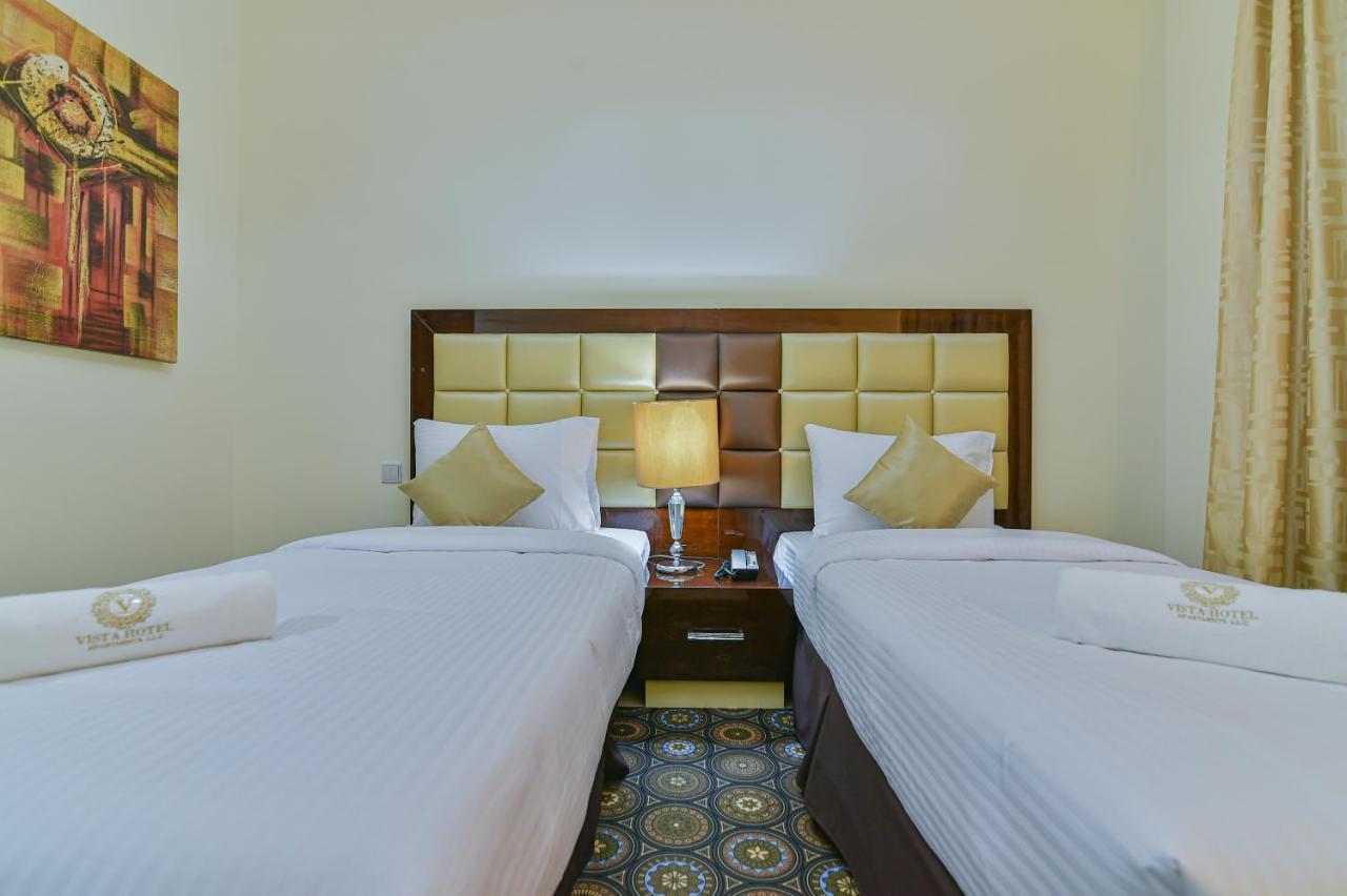 Vista Hotel Apartments Deluxe Dubai Exterior photo