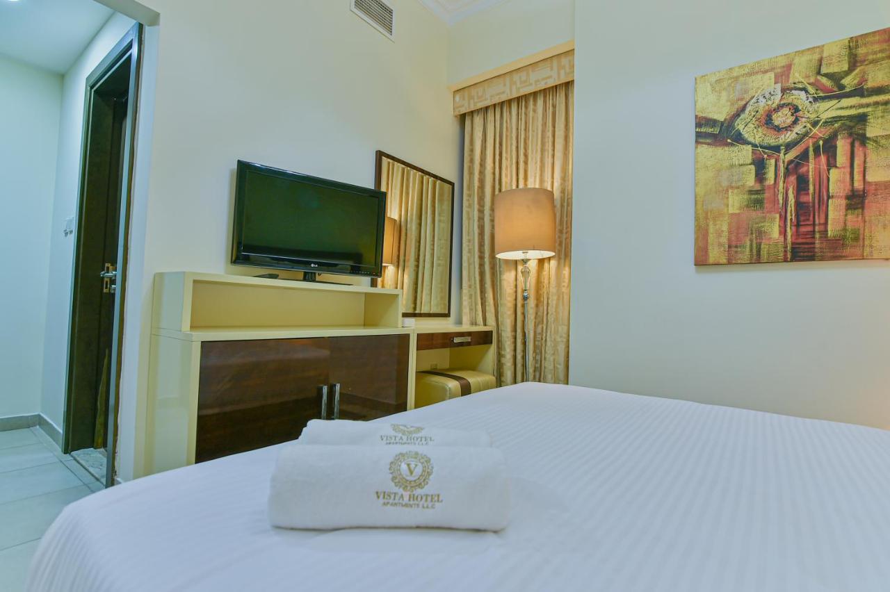 Vista Hotel Apartments Deluxe Dubai Exterior photo